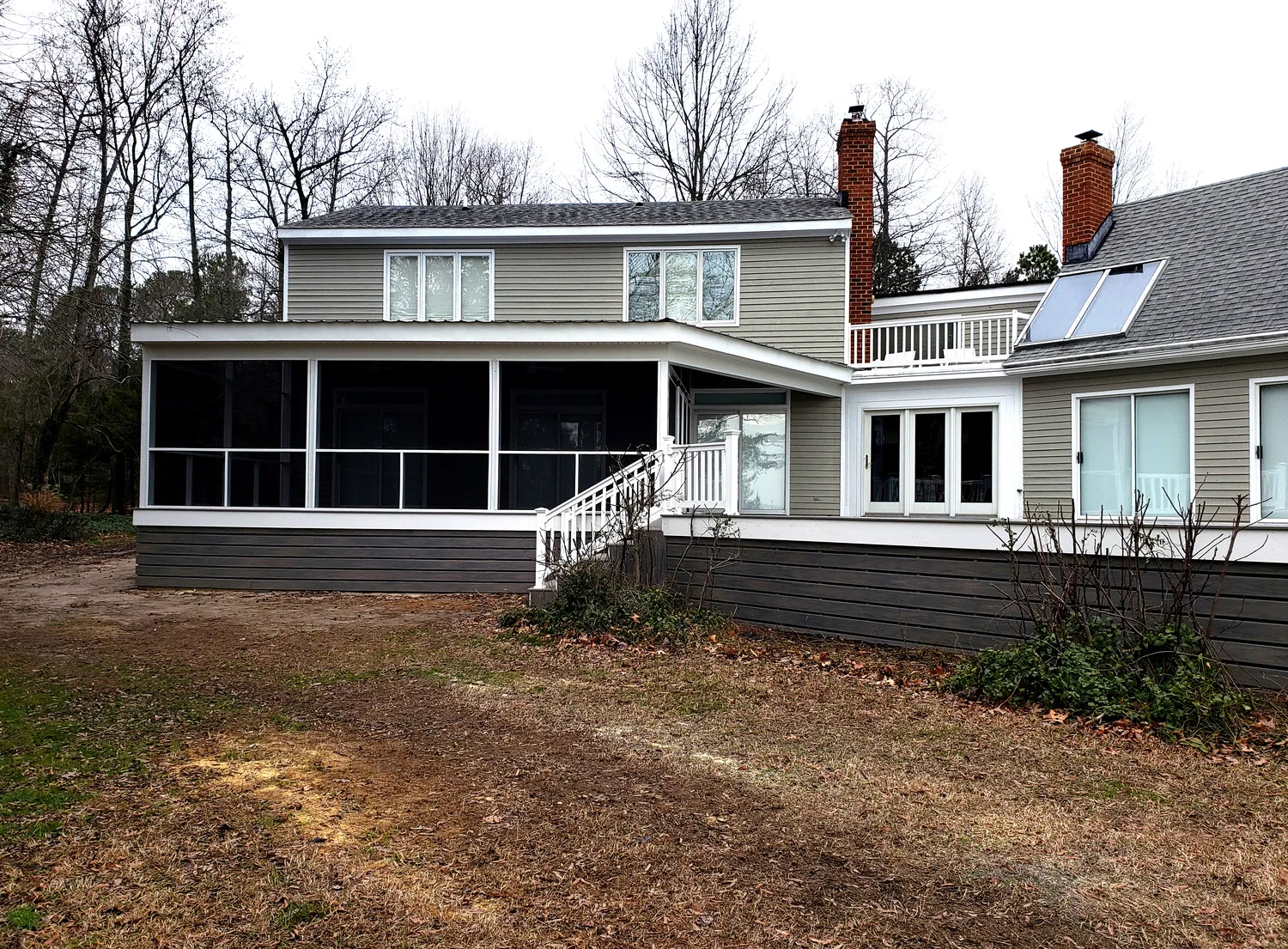 Screened porch addition overlooking a pool